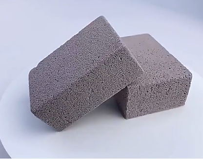 Two gray bricks on a white background
