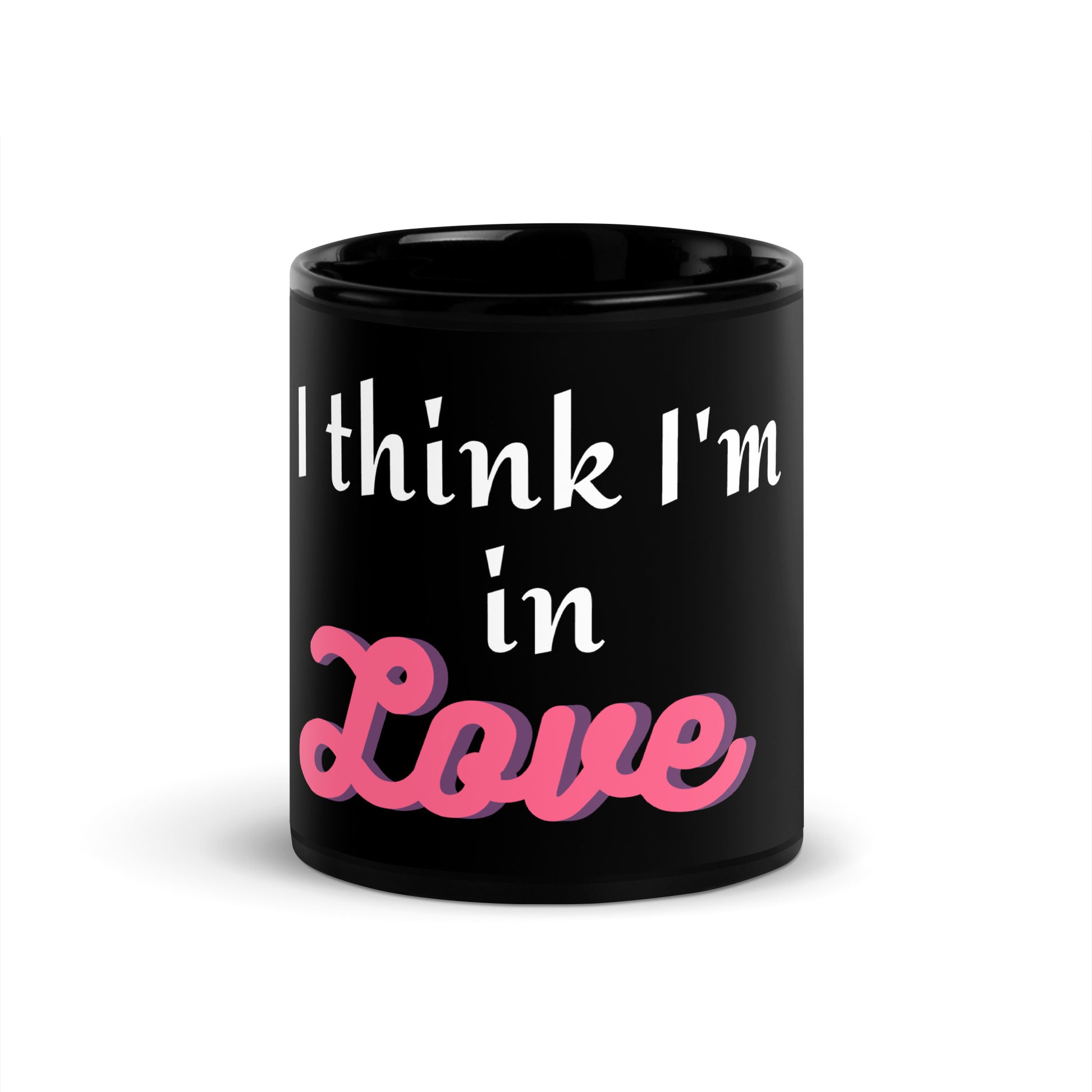 black ceramic coffee and tea mug with phrase i think im in love